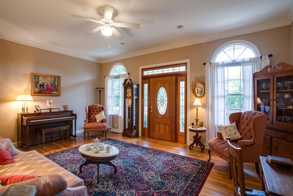 3340 Blazer Road Franklin, TN 37064 - Photo 5 of 29 a living room with furniture and a fireplace