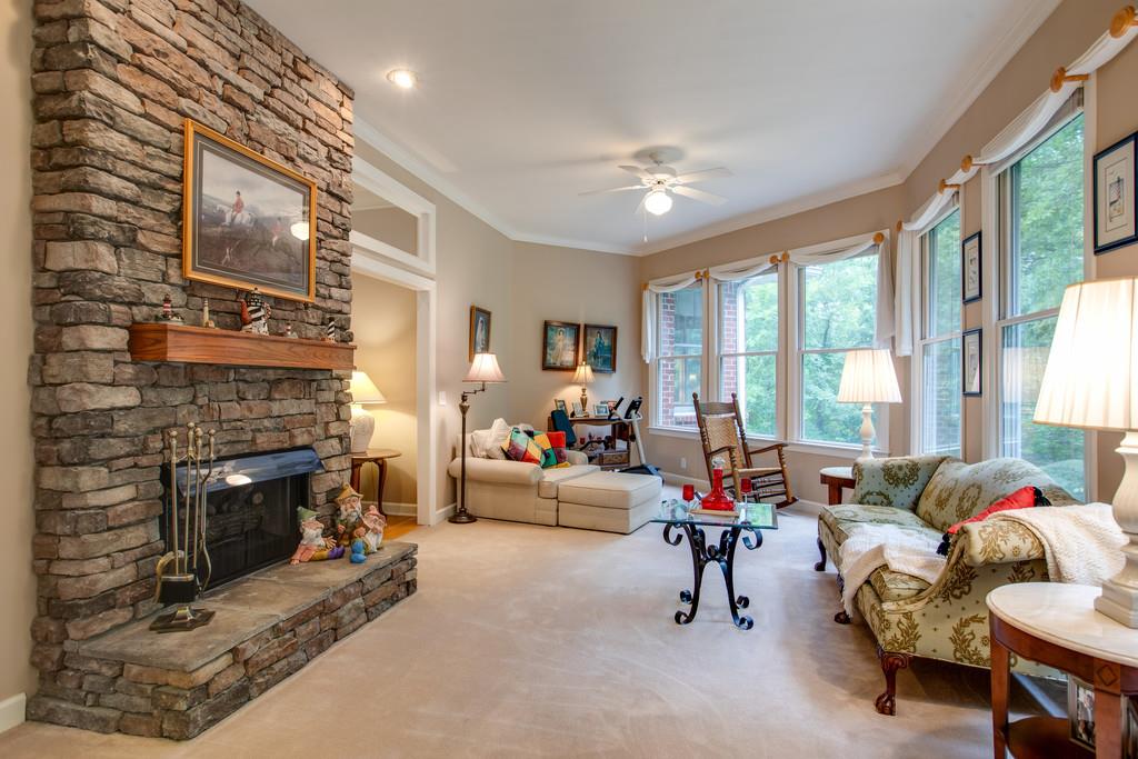 3340 Blazer Road Franklin, TN 37064 - Photo 7 of 29 a living room with furniture fireplace and a large window