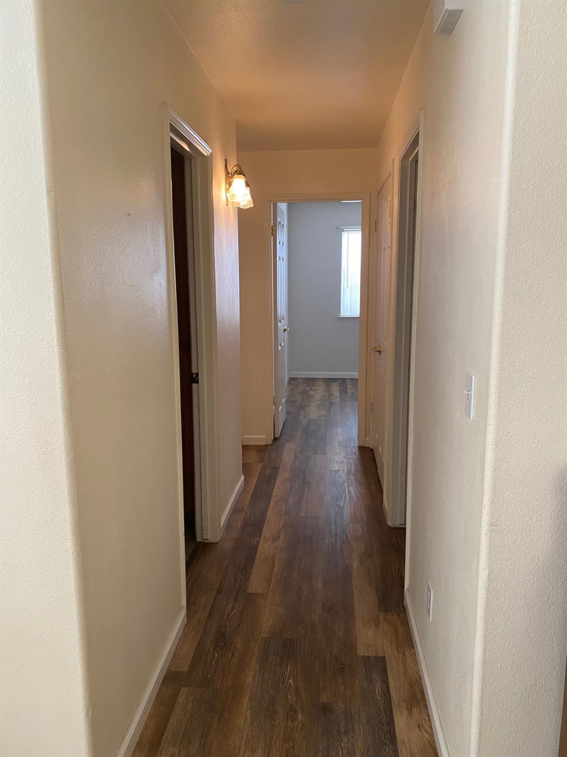 609 Merlot Avenue Madera, CA 93637 - Photo 30 of 45 a view of a room with wooden floor