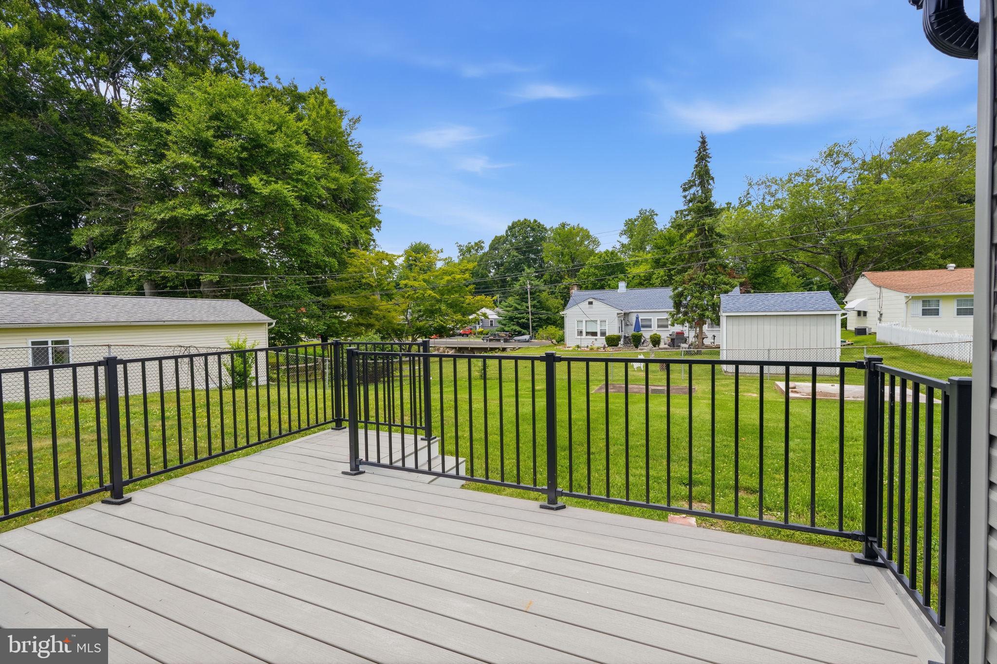 349 Andover Road Fairless Hills, PA 19030 - Photo 40 of 43 Serene backyard view from the deck.