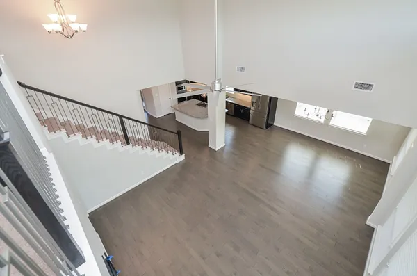 a view of a livingroom with wooden floor