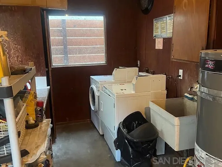 3206-16 Reynard Way San Diego, CA 92103 - Photo 12 of 12 a utility room with dryer washer and a window
