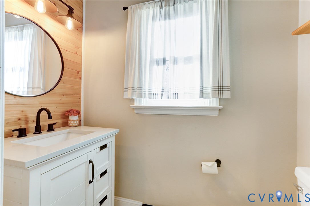 2003 Ridge Stone Court Henrico, VA 23238 - Photo 11 of 31 a bathroom with a sink and a mirror