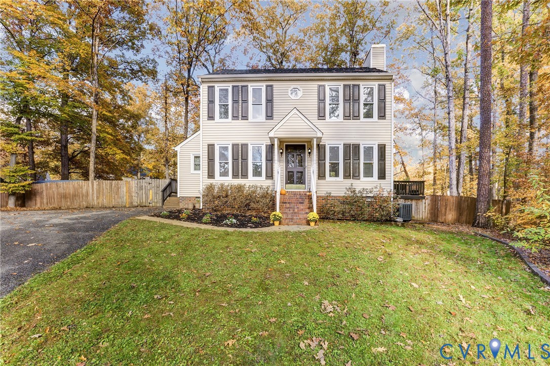 2003 Ridge Stone Court Henrico, VA 23238 - Photo 29 of 31 a front view of a house with a garden
