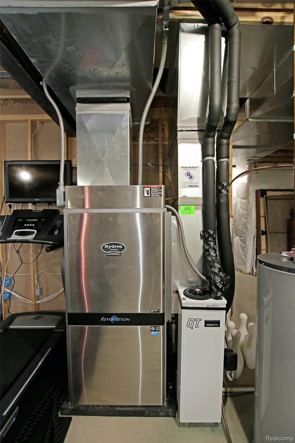 4223 Merwin Road Lapeer, MI 48446 - Photo 48 of 83 48) Geothermal Furnace.jpg