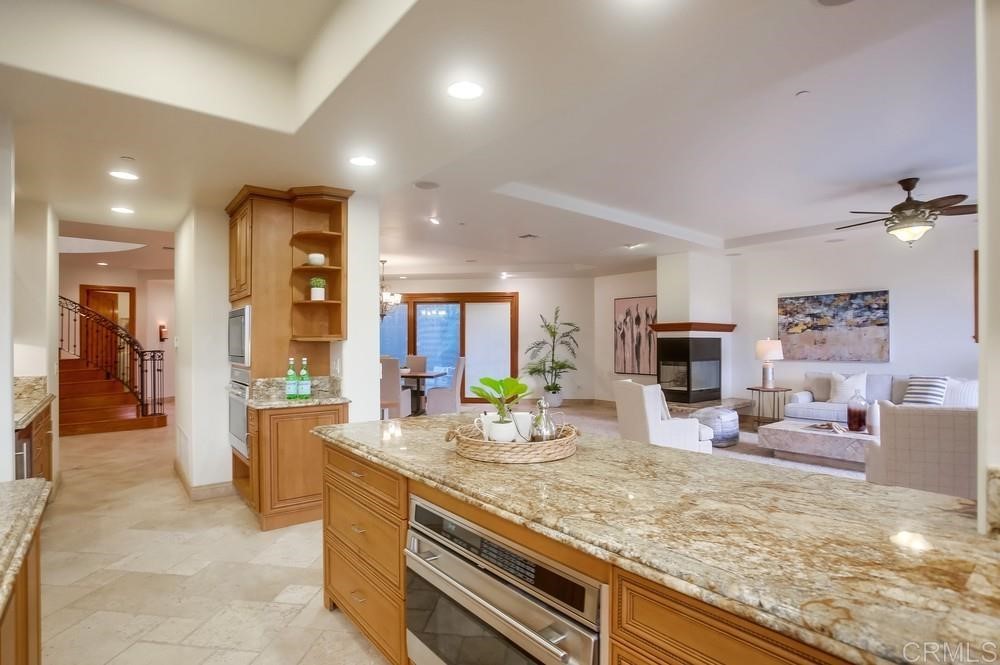 840 Highland Drive Solana Beach, CA 92075 - Photo 13 of 24 a view of living room with granite countertop furniture and fireplace