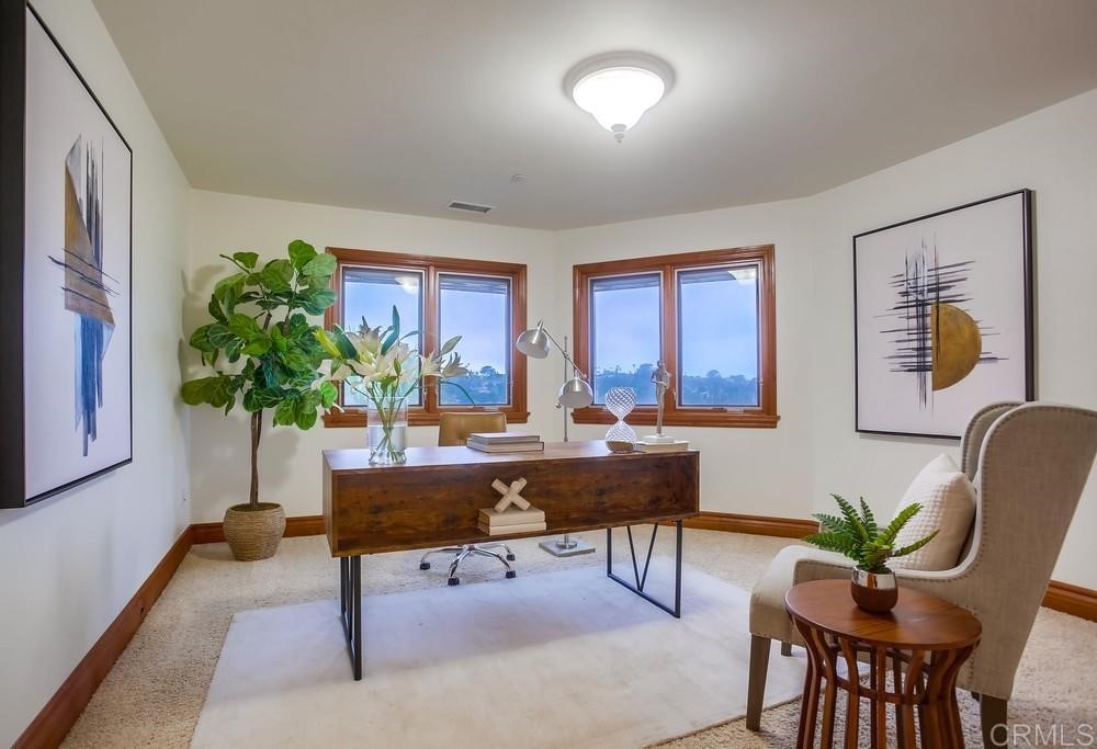 840 Highland Drive Solana Beach, CA 92075 - Photo 17 of 24 a view of a livingroom with furniture and a potted plant