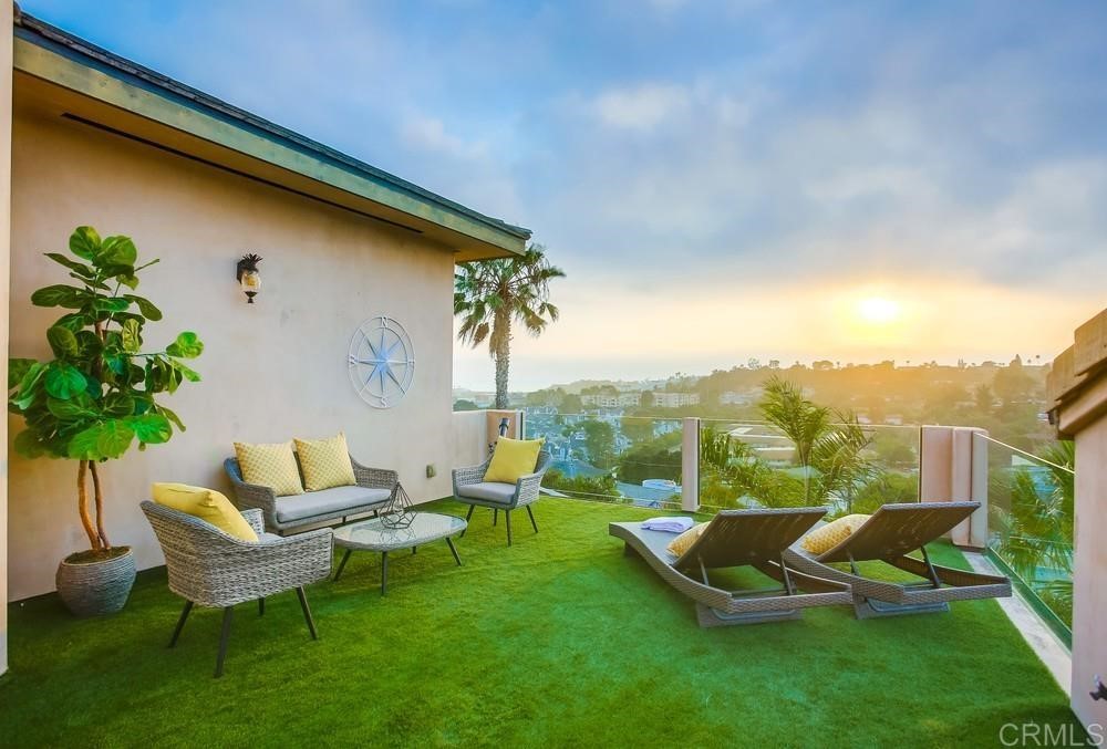 840 Highland Drive Solana Beach, CA 92075 - Photo 22 of 24 a view of a backyard with couches chair and a big yard
