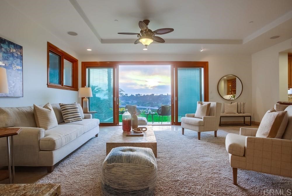840 Highland Drive Solana Beach, CA 92075 - Photo 8 of 24 a living room with furniture and a large window