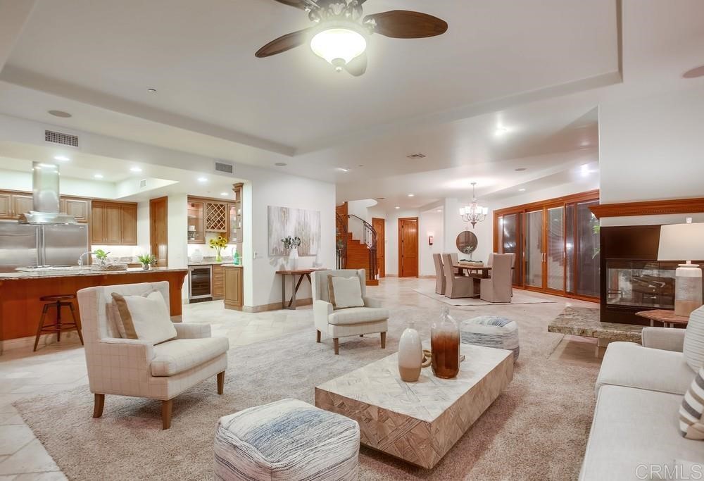 840 Highland Drive Solana Beach, CA 92075 - Photo 9 of 24 a living room with furniture and a view of kitchen