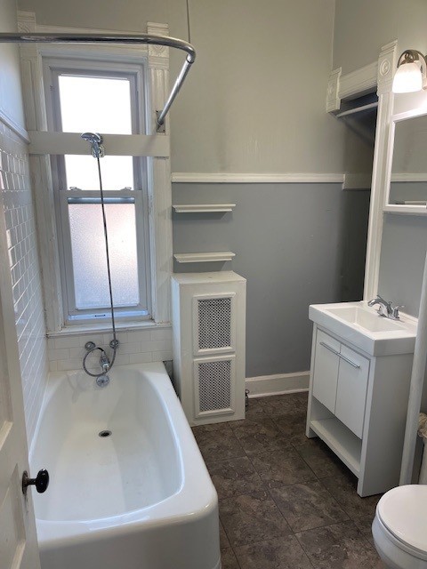 122 Elgin Avenue, Unit 2 Forest Park, IL 60130 - Photo 5 of 10 a bathroom with a sink and a vanity
