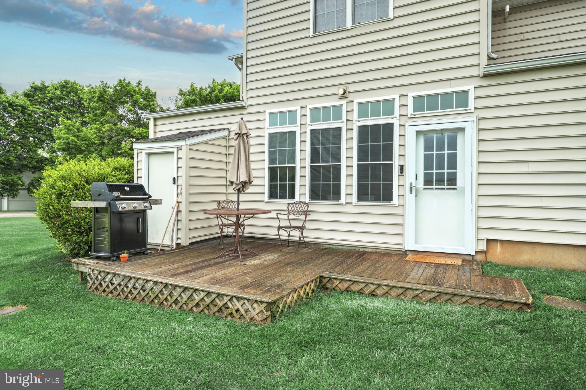 6927 York Road Abbottstown, PA 17301 - Photo 10 of 41 a view of a house with a yard and sitting area