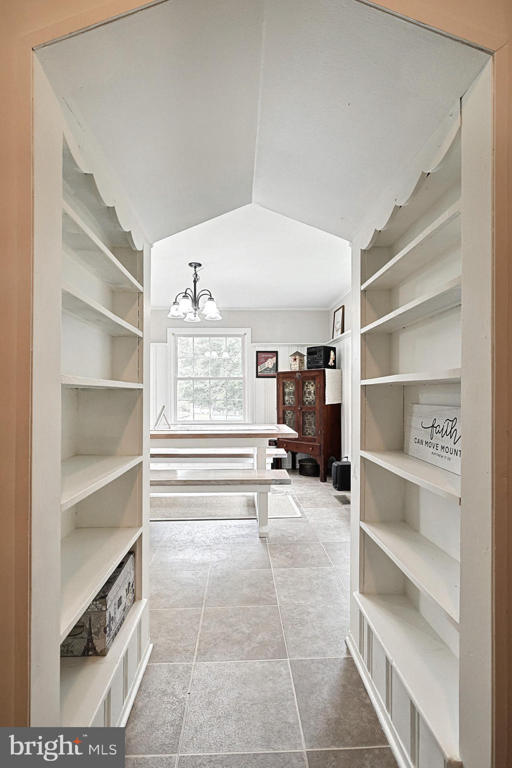 6927 York Road Abbottstown, PA 17301 - Photo 13 of 41 a view of walk in closet with empty racks