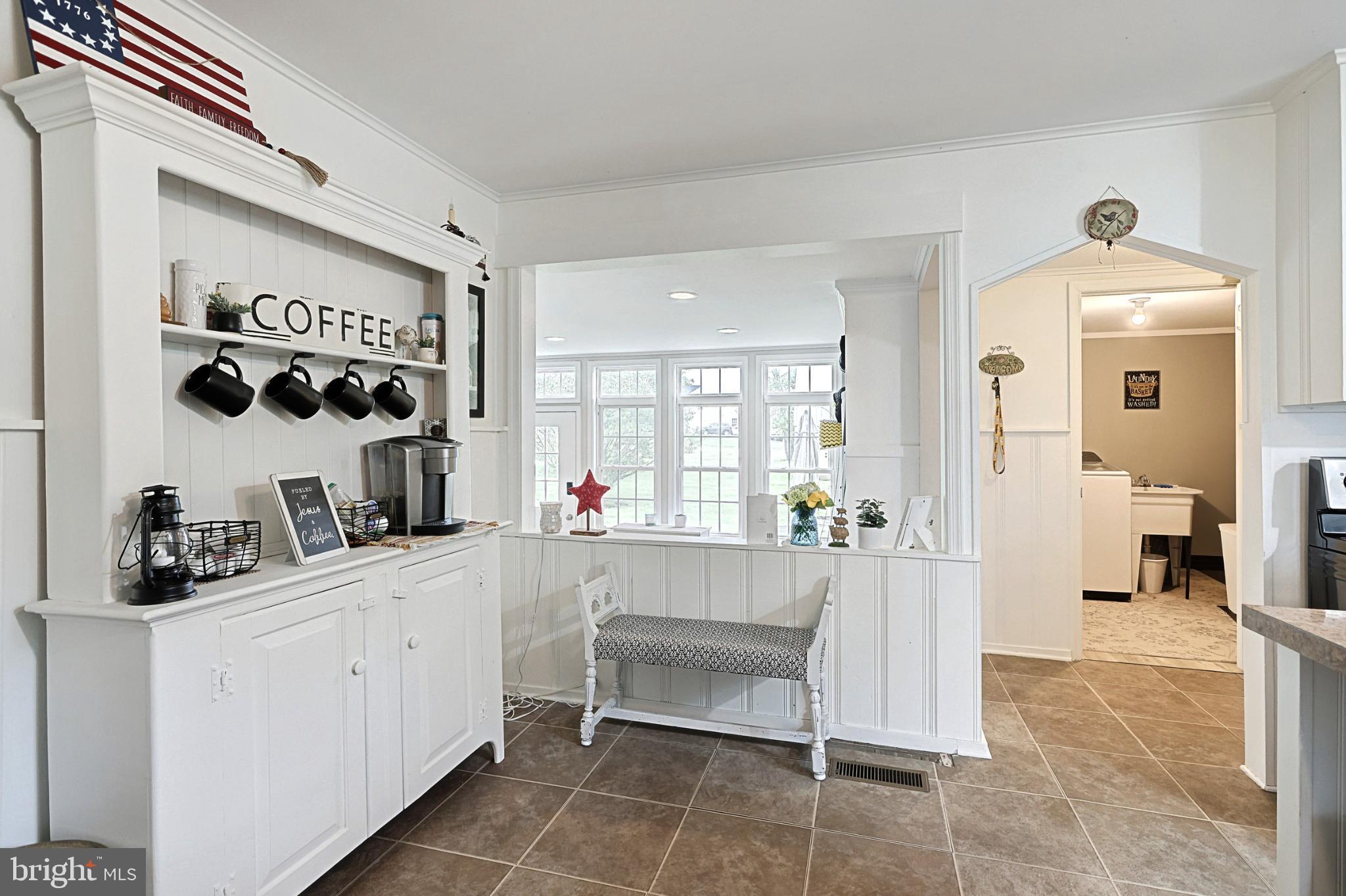6927 York Road Abbottstown, PA 17301 - Photo 23 of 41 a kitchen with a refrigerator and a sink