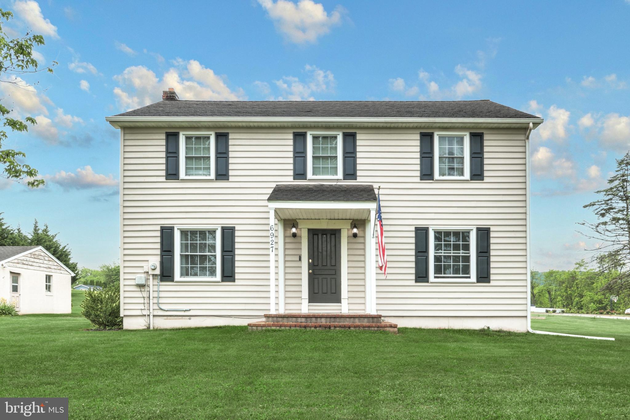 6927 York Road Abbottstown, PA 17301 - Photo 5 of 41 a house that has a garden