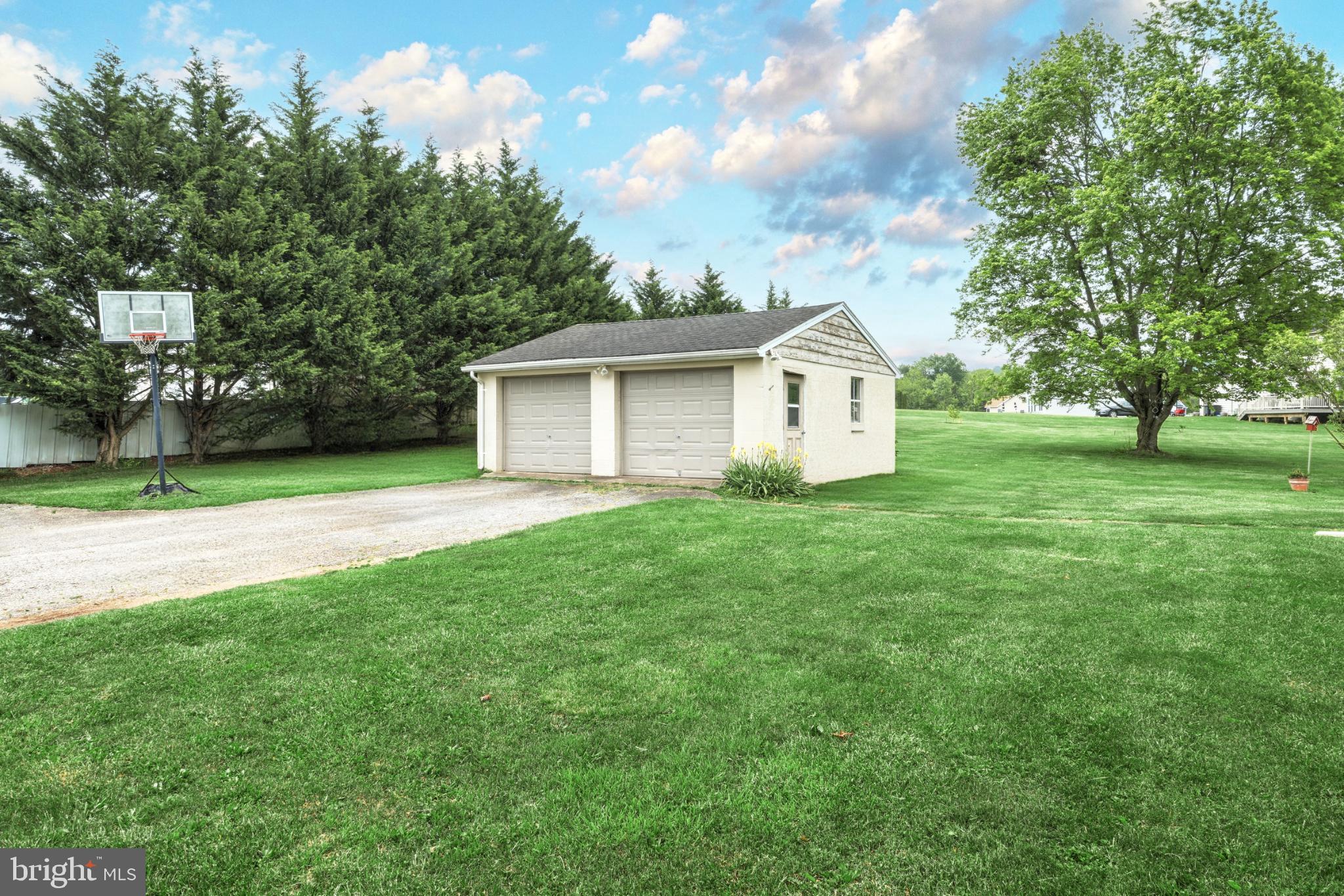 6927 York Road Abbottstown, PA 17301 - Photo 6 of 41 a front view of house with yard and green space