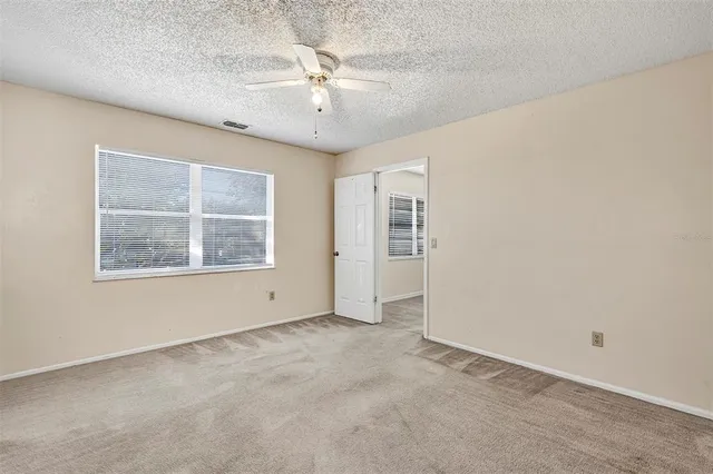 $179,000 | 168 Windtree Lane, Unit 203, Winter Garden, FL 34787