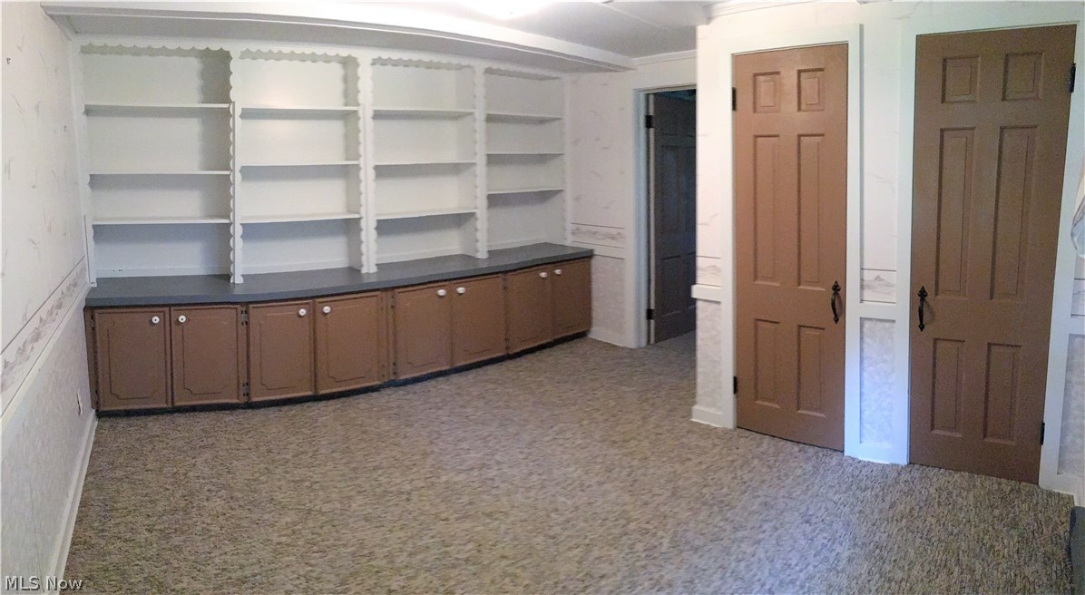 2601 Ridgedale Avenue Northwest Canton, OH 44708 - Photo 23 of 24 Look at the built in shelving and cupboards! Storage galore in this house.