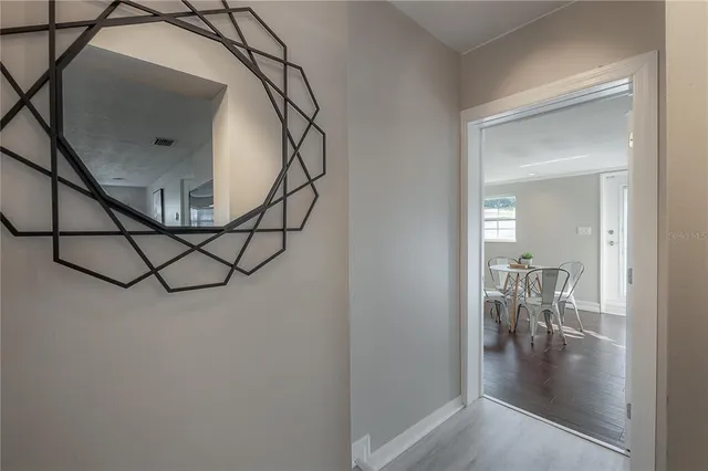 a view of a livingroom from a hallway