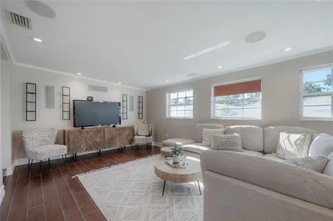 a living room with furniture and a couch