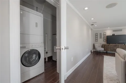 a view of a hallway with washer and dryer