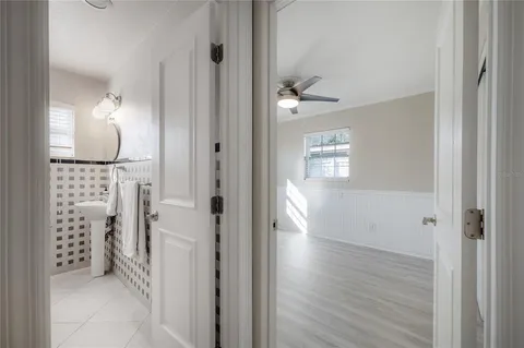 a bathroom with a bathtub and shower