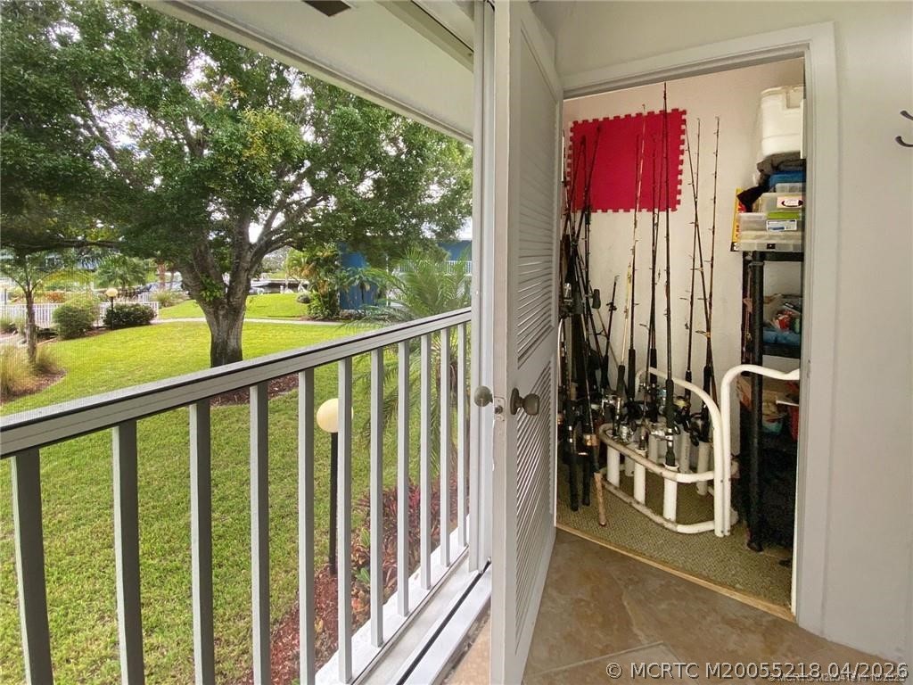 1854 Southwest Palm City Road, Unit 203 Stuart, FL 34994 - Photo 21 of 38 storage closet on the lanai