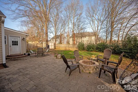 a view of a patio with a yard