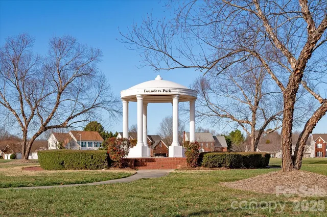 a front view of a house with swimming pool
