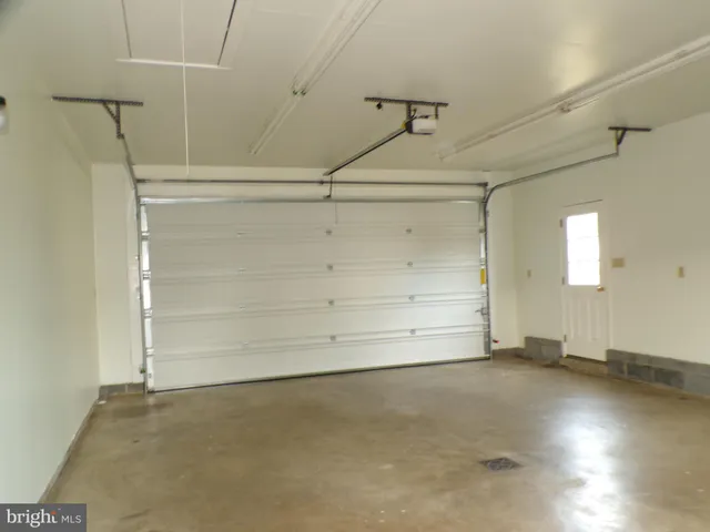 a view of a room with an empty space