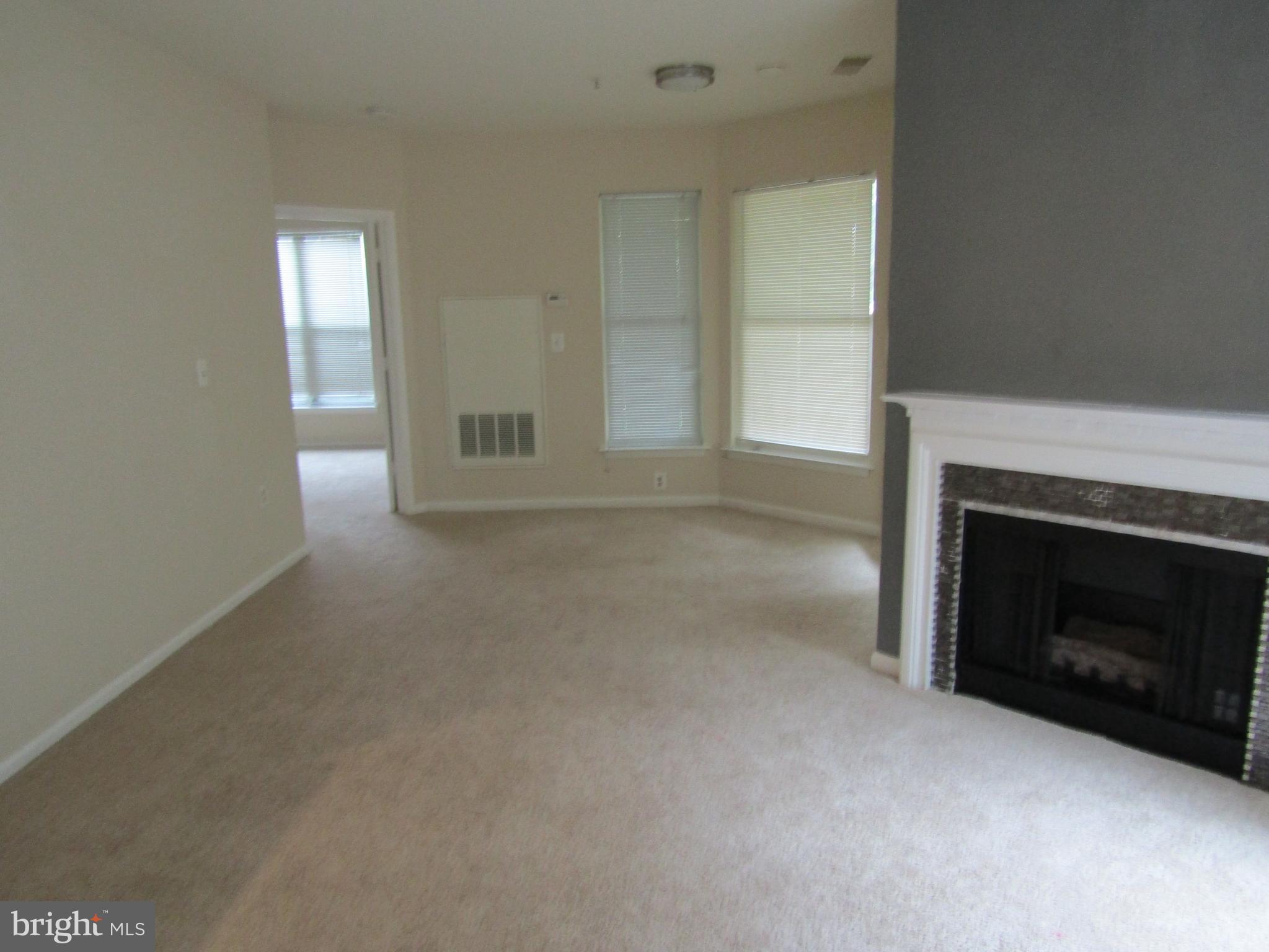12919 Alton Square, Unit 106 Herndon, VA 20170 - Photo 9 of 44 Living and Dining Rooms