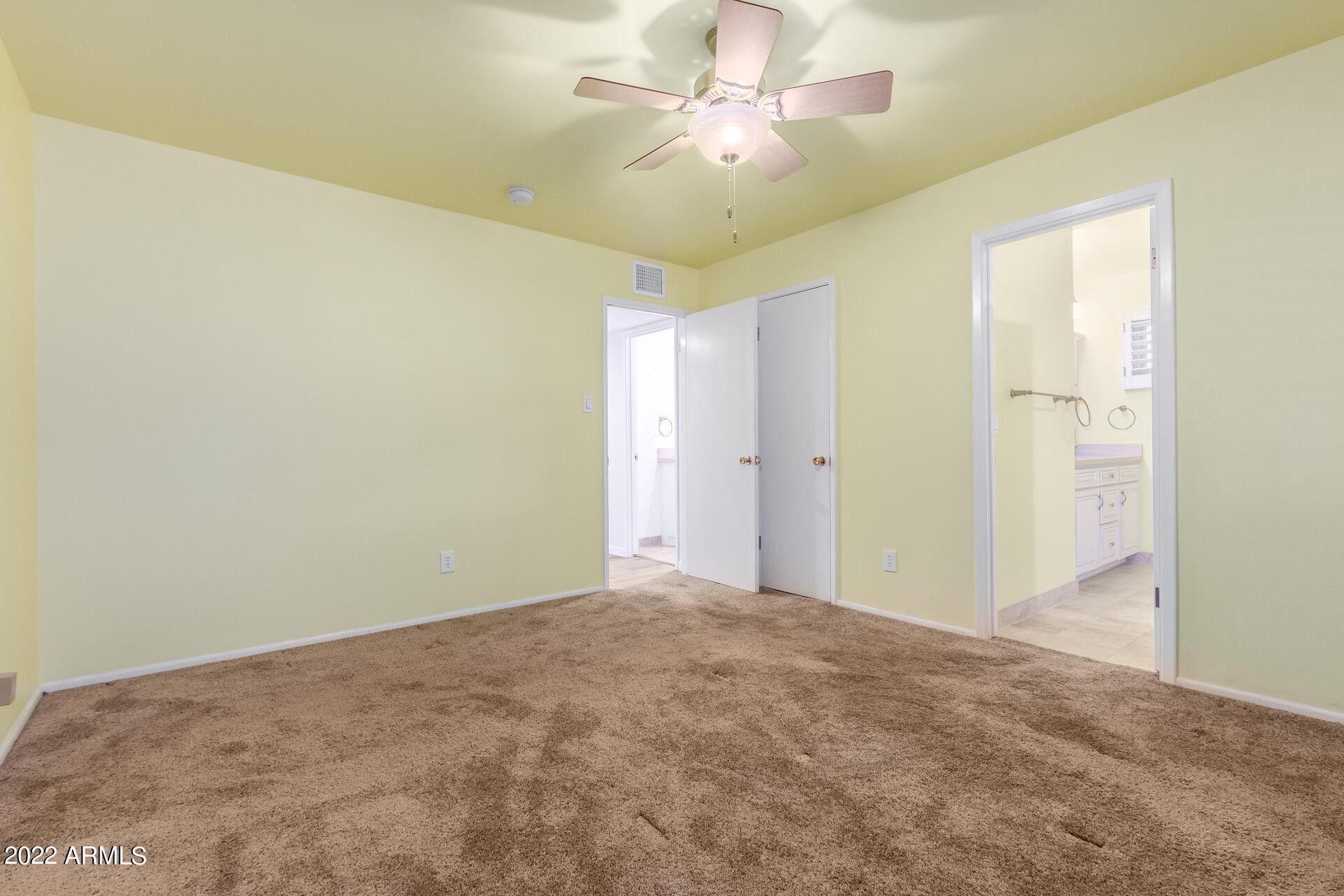 1211 West Hayward Avenue Phoenix, AZ 85021 - Photo 21 of 26 a view of a big room with carpet
