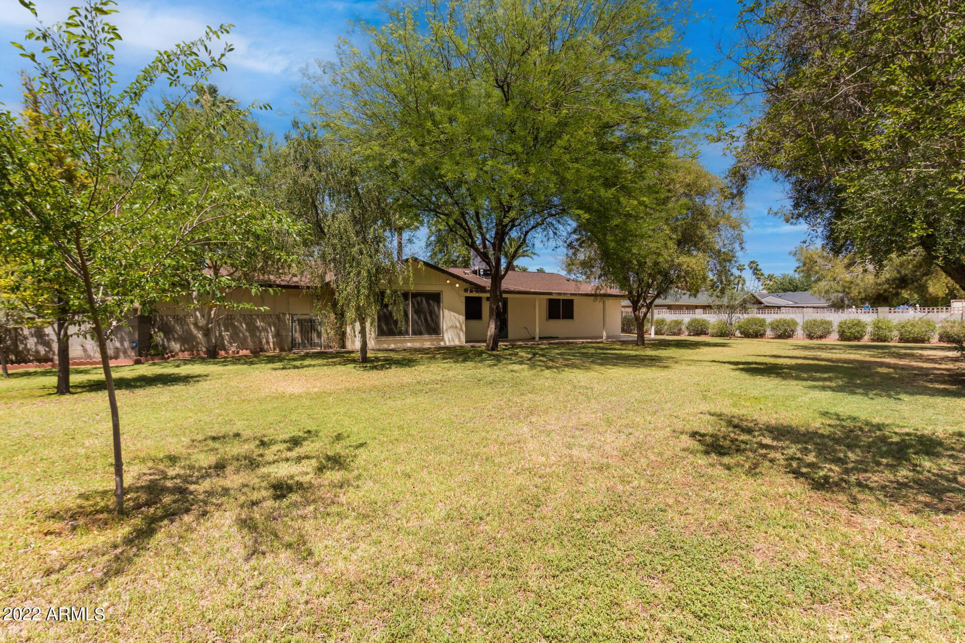 1211 West Hayward Avenue Phoenix, AZ 85021 - Photo 26 of 26 a house with swimming pool in front of it