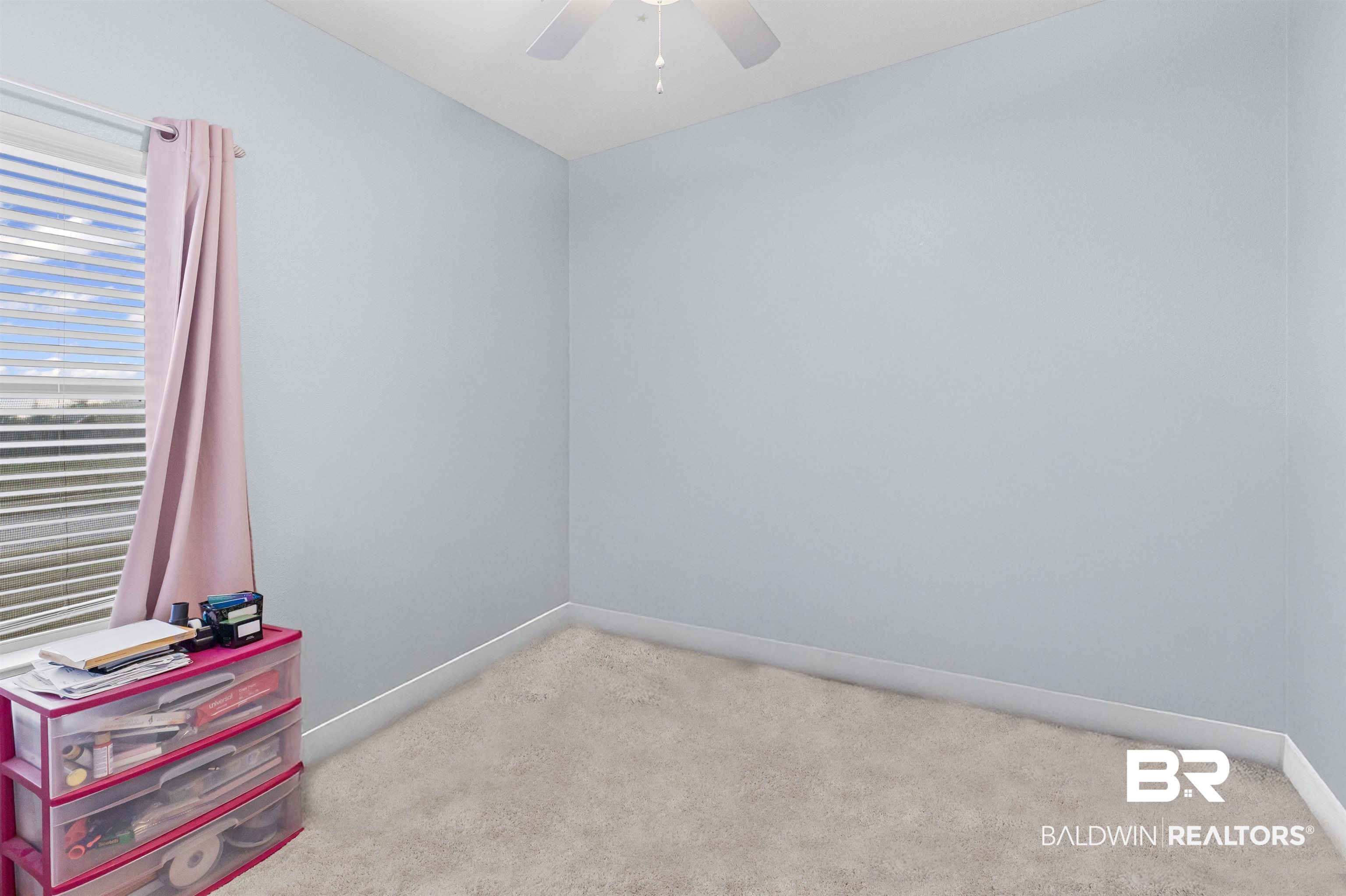 4107 Nottingham Drive Semmes, AL 36575 - Photo 17 of 23 Spare room featuring light colored carpet and a ceiling fan