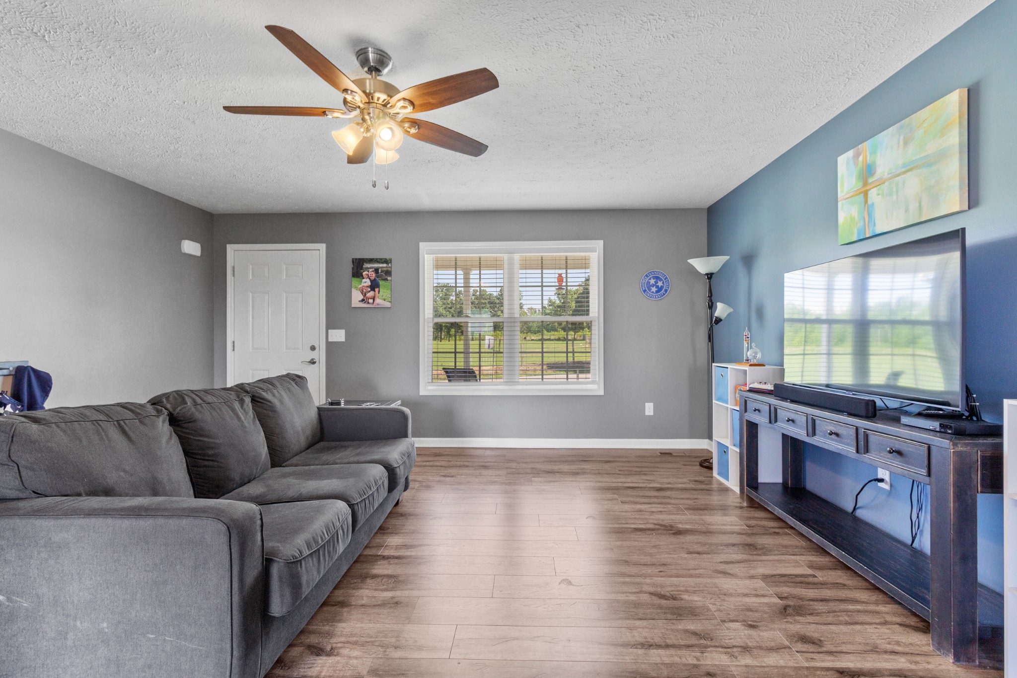 3874 Asbury Road Manchester, TN 37355 - Photo 6 of 25 a living room with furniture and a flat screen tv