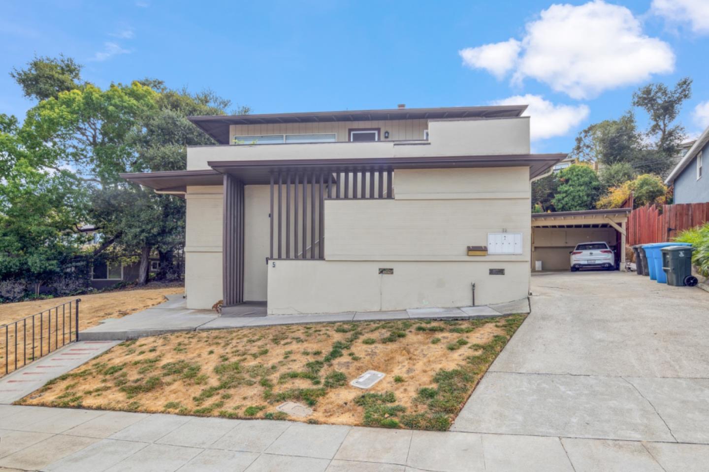 64 Laurel Street San Carlos, CA 94070 - Photo 1 of 7 a front view of a house with a yard