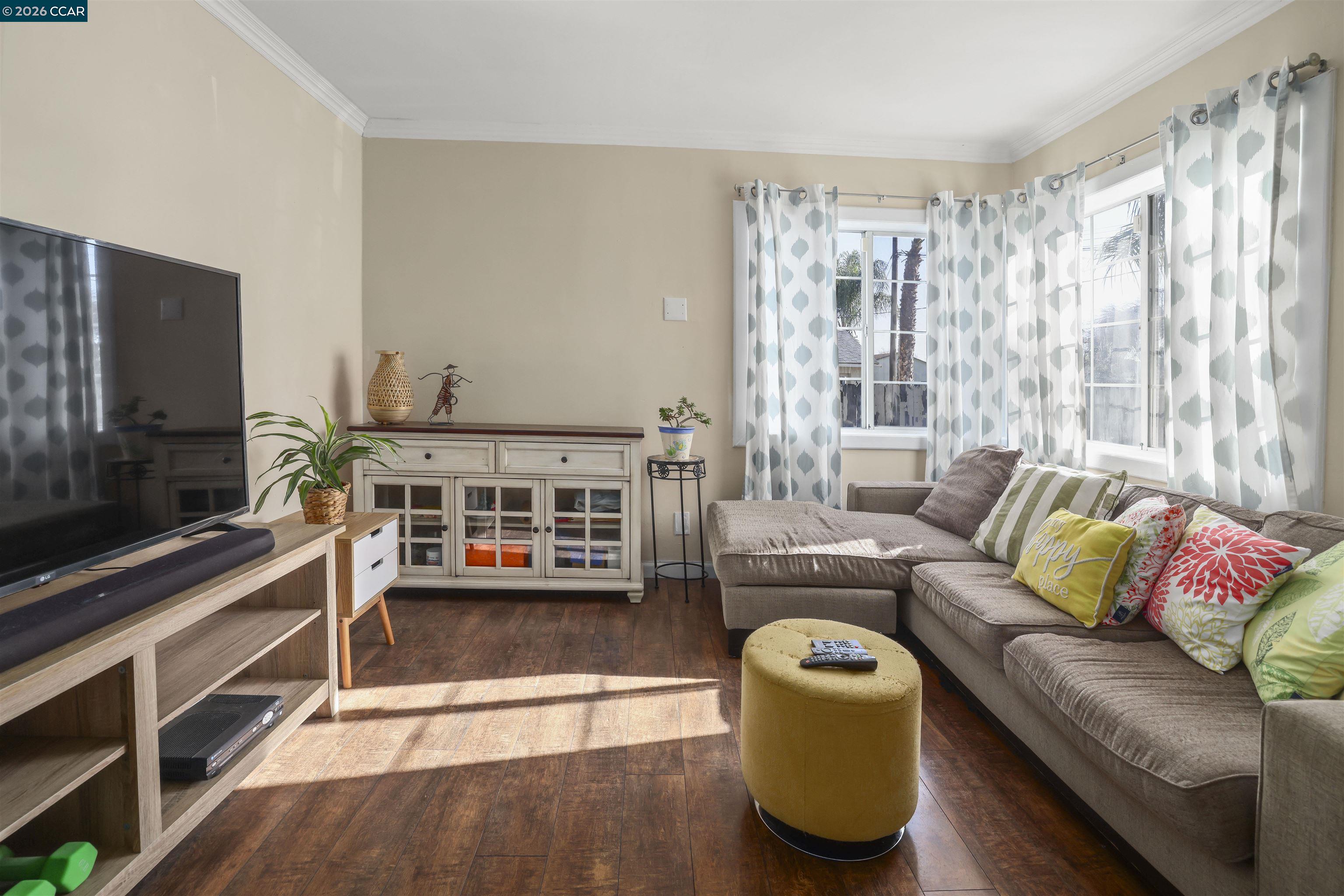 35 Jefferson Street Bay Point, CA 94565 - Photo 4 of 13 a living room with furniture and a flat screen tv