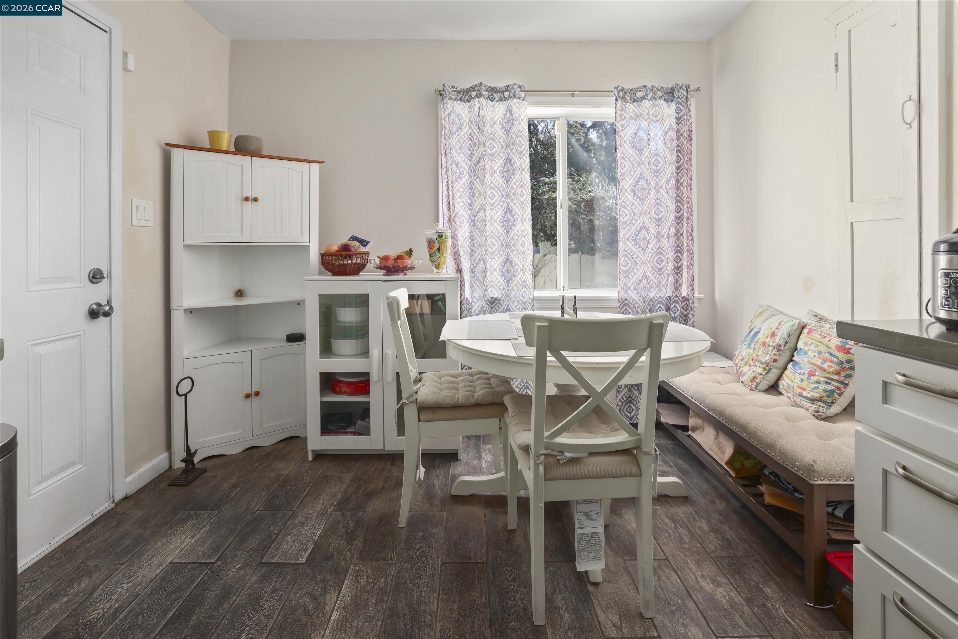 35 Jefferson Street Bay Point, CA 94565 - Photo 7 of 13 a living room with furniture and a wooden floor