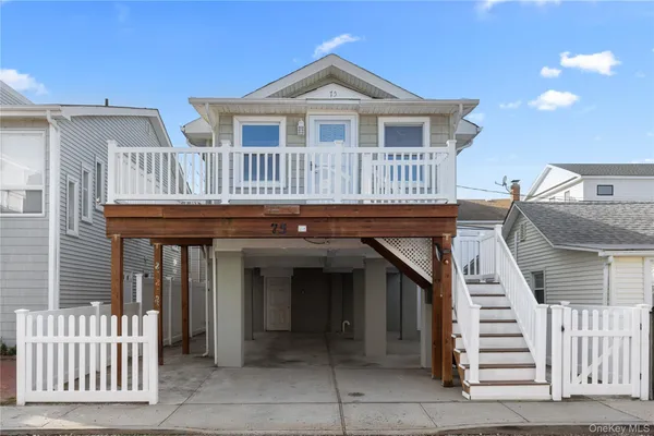 a view of a house with a deck