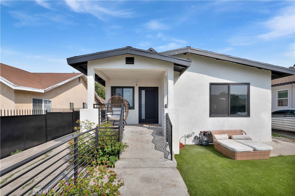 3115 Arvia Street, Unit 1A Los Angeles, CA 90065 - Photo 1 of 45 a front view of a house with patio