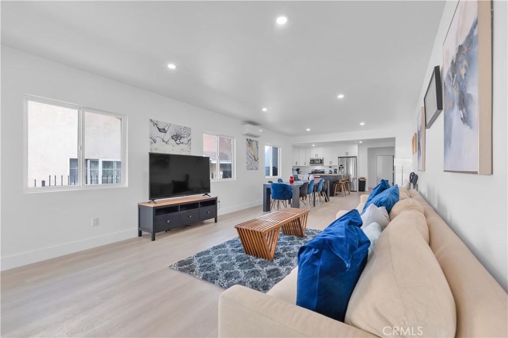 3115 Arvia Street, Unit 1A Los Angeles, CA 90065 - Photo 13 of 45 a living room with furniture and a flat screen tv