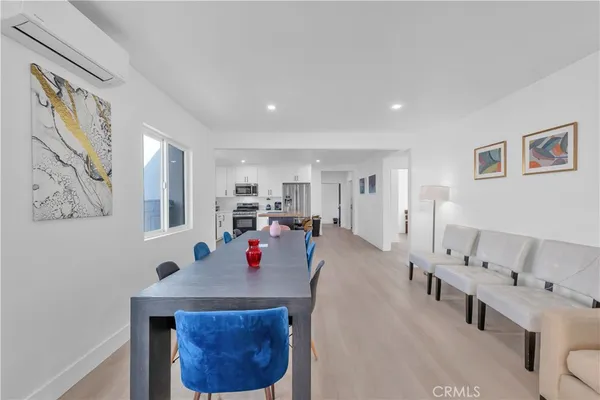 a view of a living room and dining room