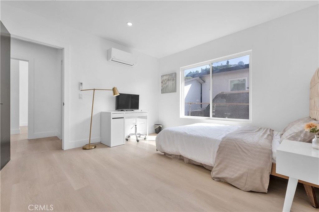 3115 Arvia Street, Unit 1A Los Angeles, CA 90065 - Photo 26 of 45 a bedroom with a bed and a flat screen tv