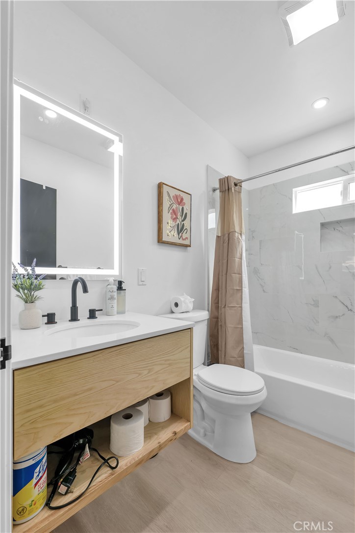 3115 Arvia Street, Unit 1A Los Angeles, CA 90065 - Photo 28 of 45 a bathroom with a sink a toilet and a bathtub