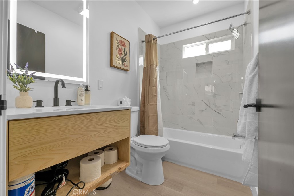 3115 Arvia Street, Unit 1A Los Angeles, CA 90065 - Photo 29 of 45 a bathroom with a sink a toilet and shower