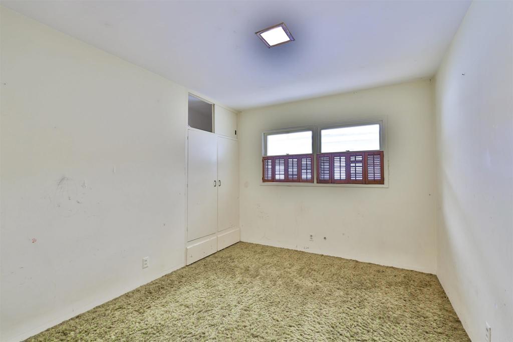 5930 Waverly Avenue La Jolla, CA 92037 - Photo 13 of 61 an empty room with windows