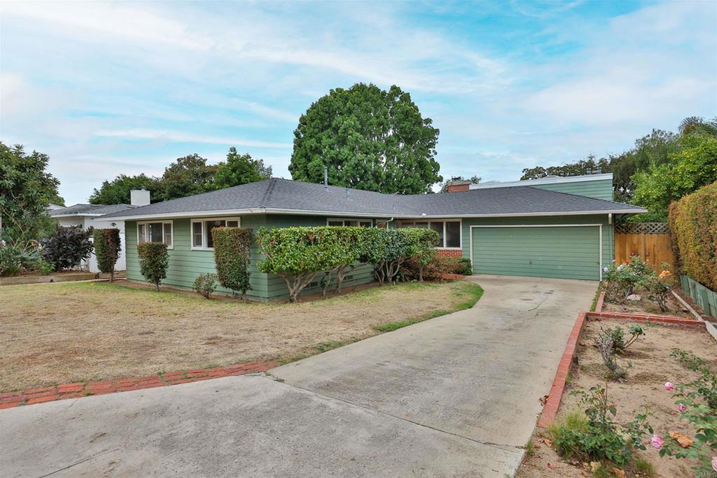 5930 Waverly Avenue La Jolla, CA 92037 - Photo 2 of 61 front view of a house with a yard