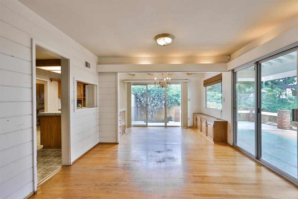 5930 Waverly Avenue La Jolla, CA 92037 - Photo 27 of 61 wooden floor in an empty room with a window
