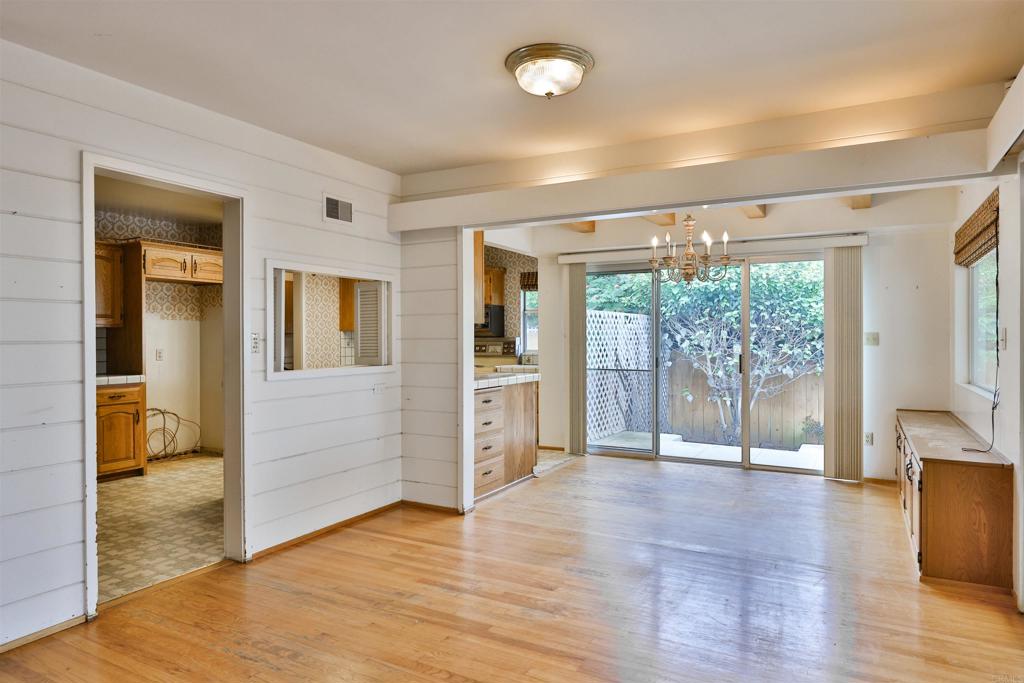 5930 Waverly Avenue La Jolla, CA 92037 - Photo 28 of 61 wooden floor and an empty room with wooden floor and a window