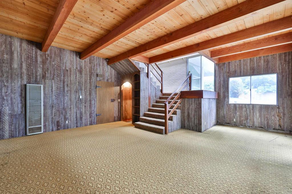 5930 Waverly Avenue La Jolla, CA 92037 - Photo 43 of 61 a view of an empty room with windows & cabinet